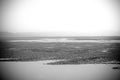 Black and white image of inlet at low tide Royalty Free Stock Photo