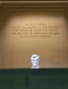 statue of person, at the lincoln memorial of abraham lincoln, with quote