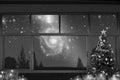 Black and white image of lonely Christmas celebration night