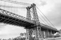 Black and White Image of Manhattan Skyline and Manhattan Bridge. Manhattan Bridge is a suspension bridge that crosses the East Riv Royalty Free Stock Photo