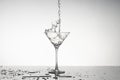 Black and white image of a martini glass with splashes Royalty Free Stock Photo