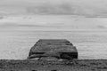 A black-and-white image of the old pier heading into the Atlantic ocean