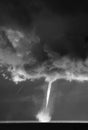 Black and white image of a rising waterspout over the ocean, cloud mass, dramatic Royalty Free Stock Photo