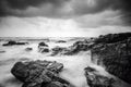 Black and white image,soft wave flow hitting the sandy beach