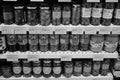 Black and White Image of Traditional Turkish Pickles Of Various Fruits And Vegetables. Jars Of Salted Pickles On A Shelf. Beetroot Royalty Free Stock Photo