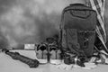 Black and white image of travel materials and tools