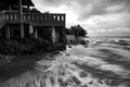 Black and white image wave hitting the coastline Royalty Free Stock Photo