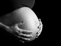 Black and white image of a 36 weeks pregnant woman Royalty Free Stock Photo