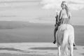 Black and white image young woman riding a horse Royalty Free Stock Photo