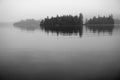 Black and White islands in still lake