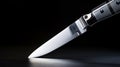 Sharp Knife On Dark Floor: High Contrast Close-up With Studio Lighting