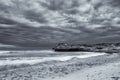 Black and white landscape of ocean rocks and clouds artistic con Royalty Free Stock Photo