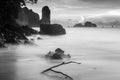 black and white landscape with rocks in the sea at dawn Thailand Royalty Free Stock Photo