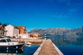 Black and white lighthouse in the sea. Prcanj, Kotor Bay, Monten Royalty Free Stock Photo