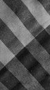 Black and white loincloth texture with dark gingham seamless pattern, vintage abstract plaid Royalty Free Stock Photo