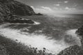 Black and White Long Exposure with Ocean, sky, Vegetation and Lava Rocks in Kaupo Beach, Maui, Hawaii - USA Royalty Free Stock Photo