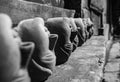 Black and white many head mould of godess durga made of earth for idol construction at kumartuli.Durga Puja