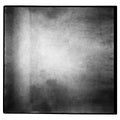 Black and white medium format film background with grain and light leak. Royalty Free Stock Photo