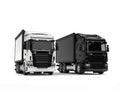 Black and white modern heavy transport trucks - beauty shot