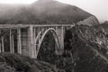 A black and white moody shot of Bixby Bridge on the Big Sur coastal highway Royalty Free Stock Photo