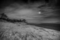 Black and White Moon Rise Over Sand Dunes