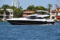 Black and white motor yacht on the Florida Intra-Coastal Waterway