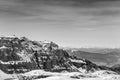 Black and white mountain winter landscape. Snow Alps and rocks