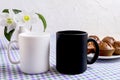 Black and white mug mockup with chocolate muffins Royalty Free Stock Photo