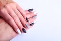 Black, white Nail art manicure. Holiday style bright Manicure with sparkles. Beauty hands. Stylish Nails, Nail Polish Royalty Free Stock Photo