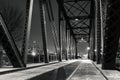 Black and white night photograph from under the Cherry Avenue Z-2 asymmetric bob-tail railroad swing bridge looking towards the Royalty Free Stock Photo