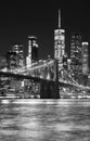 Black and white night view of Brooklyn Bridge and Manhattan waterfront, New York City, USA Royalty Free Stock Photo