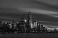 Black and White Nighttime Skyline of the New York City Financial District along the Hudson River Royalty Free Stock Photo