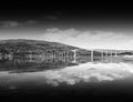 Black and white Norway bridge with reflection landscape background