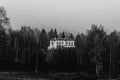 Black and white old hotel in a forrest Royalty Free Stock Photo