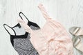 Black and white and pale pink top, silver shoes. Fashionable con