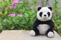 Black and white panda doll.