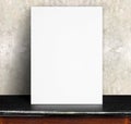 Black White paper poster lean at concrete wall and black marble Royalty Free Stock Photo