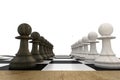 Black and white pawns facing off Royalty Free Stock Photo