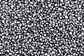 Black-white pebble texture background. Seamless stone pattern