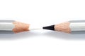 Black and white pencils on white paper. Royalty Free Stock Photo