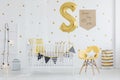 Pennants hanging on crib Royalty Free Stock Photo