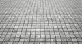 Black and white perspective view of a tiled wall with a repeating grid pattern tiles tiling Royalty Free Stock Photo