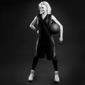 Black and white phoro of female basketballer Royalty Free Stock Photo