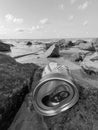 black and white photo of an abandoned can on the beach Royalty Free Stock Photo