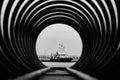 Sea ship in a spiral frame, that stands at the pier,