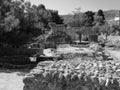 Black and white photo Ancient Nymphaion, ruins of an abandoned archaeological site