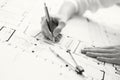 Black and white photo of architect working on house plan Royalty Free Stock Photo