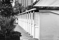 Black and white photo of beach cabins.