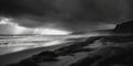 A black and white photo of a beach. Generative AI image. Royalty Free Stock Photo