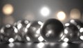 a black and white photo of a bunch of shiny balls